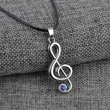 EPJ Treble Clef with Blue Rhinestone on Black Round Rope Necklace
