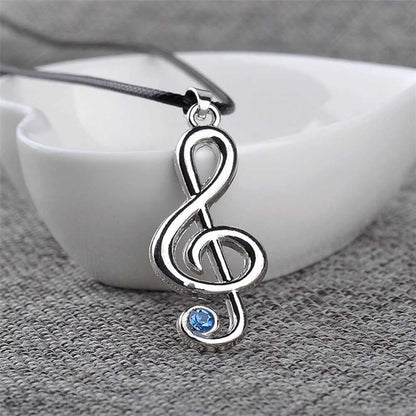 EPJ Treble Clef with Blue Rhinestone on Black Round Rope Necklace