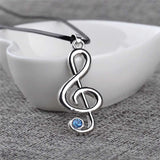 EPJ Treble Clef with Blue Rhinestone on Black Round Rope Necklace